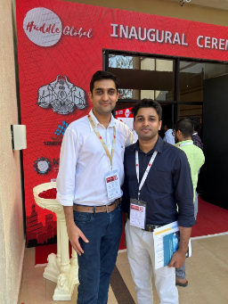 Two attendees at Huddle Global ceremony